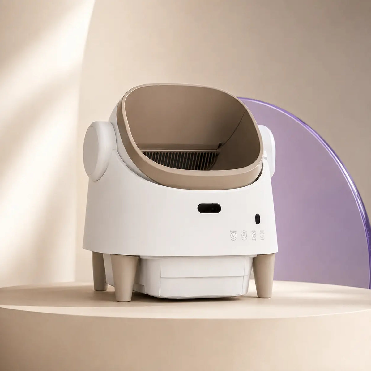 Tail & Co. automatic self-cleaning litter box in a warm home